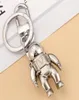 Модный стильный роскошный дизайнерский брелок Классические бренды Пряжка для ключей Подвеска-космонавт Матовые серебряные брелки для мужских женских сумок Pe6777469