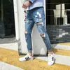 Najwyższej jakości drożdżone jeansy męskie giganty Raped Hole przystojne stopy Hip Hop Streetweat Cowboy Harem Pants Men 240104