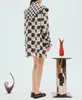 オーストラリアのデザイナードレスブラックシルク長袖スタンドカラー偽のショールフローラルプリントシャツミニドレス