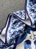 夏の滑走路青と白の磁器の非対称性ロングドレス女性セクシーな肩のフリル裾ルーブマキシベスティドス240105