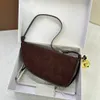 Luxe designer schoudertas in kalf echte lederen spiegelkwaliteit mode kleine crossbody tas met afneembare belcharm voor vrouwen met volledig pakket