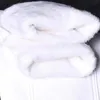 冬の厚いベルベットの男性スキニーウォームジーンズ高品質の白いフリーススリムフィットストレッチカジュアルデニムズボンペンシルパンツ240104