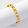 Van Clover Armband 2024 Ny dubbelsidig ormformad armband Kvinnlig Gilded Four Leaf Clover Inlaid Process Nail Zircon With Box