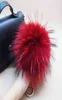 16 cm de luxe y réel boule de fourrure de raton laveur pompon en peluche taille véritable fourrure porte-clés anneau en métal pendentif sac charme K042-rouge 2104098978125