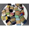 Herrensocken Großhandel Herren Damen Designer Schneestiefelstrümpfe 2 Paar Wolle Baumwolle Elastizität Dicke Mischung Farben Briefdruck Keep War Dh2Oi