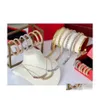 Bracciale Collana Set di gioielli di moda di marca per le donne Placcato in oro Rive Steam Punk Party Clash Design Orecchini Ri Drop Set di consegna Dhwzu