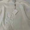 Pull de créateur femmes blanc mince tricot Sweaters24ss nouvelles femmes automne à la mode à manches longues haut haut de gamme mince pull manteau