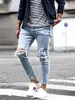 Ljusblå mager jeans män streetwear förstörda rippade homme hiphop trasiga modis manlig blyertscyklist ihålig jean byxor 240104