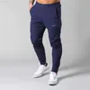 LYFT 2021 Séchage rapide Joggers Pantalons de survêtement Hommes Slim Pantalons décontractés Mâle Gym Fitness Entraînement Trackpants Sport Track Pantalon X0628