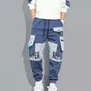 Pantalon décontracté à cordon de serrage pour hommes, avec rubans et poches à pompon, jogging hip hop cargo, pantalon de sport de travail, vêtements de rue 240105