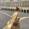 디자이너 2024 트렌치 코트 유럽 및 미국 고급 격자 무늬 스타일 패션 스티칭 가짜 두 느슨한 여성의 미드 길이 트렌치 코트