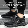 Arbetsskor ihåliga andningsbara stålstövlar lättvikt säkerhet antislippery för män kvinnor manlig sneaker 240105
