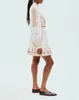Australisk designerklänning Vit bomull Stående krage Långärmad blommig broderad miniklänning