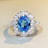 Anelli di fascia Fashion Luxury Blue Diamond Zircic Zircone Ovale Cluster Ovale Ring Zc Anello d'argento Donne 925 Anelli colorati Zirconi quadrati Ringsl240105