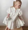 Dziewczyny bawełniane lniane sukienki Falbala Dzieci koronkowe łuki Księżniczki sukienki 2024 Summer