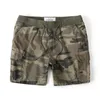 Shorts masculinos Mcikkny Homens Carga Calças Curtas Multi Bolsos Camuflagem Calças Ao Ar Livre Para Masculino Solto Fit