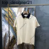 24SS Nya Europa herrar polo skjortor kvinnor rand skarv t shirt män mode märke skruv bomull lapptäcke polos bokstäver casual mens polo tshirts