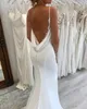 Boho Spaghetti Sirène Robes De Mariée Sexy Dos Nu Longue Ivoire Satin Plage Robes De Mariée Dentelle Appliques Col En V Été Mariée Porter Boutons Arrière 2024