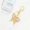 Keychains 2024 Korean Fashion Butterfly Pave Zircon Keychain Bag Car Key Chain Pendant Tiny Exquisite Accessories
