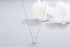 Kedjor gränsöverskridande Amazon som säljer S925 Silver High End Round Diamond Set Pendant med benben Elegans Simple Women's Necklace