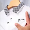 ハイエンドの格子縞のラペルポロシャツメンズカジュアルTシャツ夏のトレンドエクササイルーズラージビジネスポール240106