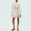 Australisk designerklänning Vit bomull Stående krage Långärmad blommig broderad miniklänning