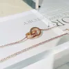 Luksusowy projektant biżuterii klasyczny tytanowy podwójny naszyjnik z podwójnym pierścieniem różowe złoto z diamentami moda wisiorek szlachetny łańcuch kołnierzyka Walentynki Prezent