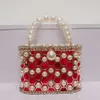 Hollow Out Pearl Water Diamond Full Sky Star Bird Cage Bag Bag Bag Bag Internet Red and Frasnable Handheld Chain Crossbody Women's Bag Premium 240106