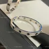 Bracciale Cartres di design CNC Precision Edition Chiodo nero da uomo Full Sky Star Tre file di diamanti con stile coppia in ceramica di alta qualità