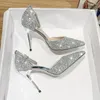 ارتداء أحذية كورية من Silver High Heels 9cm French Hollow Girl Thin Thin Thin Crystal Pointed One-Line Buckle Women's Single