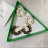 Bottegaly Venettaly Earrings Home's New Fried Dough Twists Cタイプイヤリング女性の金属insaggalate雰囲気女性用気質革のイヤリング