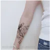 Makijaż na symulowanym tatuażu pół ramienia tygrysa z zwykłymi skrzydłami kwiatowymi, druk w przenoszeniu wody, tymczasowa naklejka jednorazowa