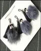 Porte-clés de voiture pour hommes et femmes, pendentif de luxe en vraie fourrure de renard avec pompon, porte-sac, ornements de voiture, accessoires porte-clés 28931039