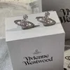 Studörhängen Western Empress Dowager Silver Saturn Vatten droppar Långt mousserande Diamond Crystal Ear Studs Klipp Två Wear Style Fashion för kvinnors smycken EFBA