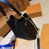 Borsa a secchiello da donna neonoe Borsa a mano Hasp di design Borsa a tracolla a tracolla di alta qualità di lusso Portafoglio pochette Trama increspata d'acqua borse neo noe da donna 22 cm Cartelle