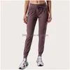 Yoga Outfit LL Femmes Yoga Neuvième Pantalon Push Fitness Leggings Doux Taille Haute Hip Lift Élastique Casual Jogging 7 Couleurs Drop Livraison Spo Dhhae