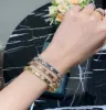 2024 Van Clover Armband Designer Armband Designer smycken för kvinnor blommig gåva toppkvalitet rostfritt stål 18k guld klassiker 2024 Nytt jul nytt år valentin