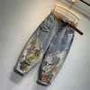 Jeans europei 2023 primavera estate nuove signore stampati pantaloni Harem in denim con diamanti moda donna Streetwear elastico in vita papà Jeans