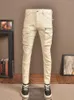 Jeans pour hommes Beige Rétro Patchwork Multi-poches Design Haut de gamme Stretch Slim Street Loisirs Cargo Pantalon de moto