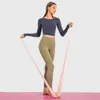 Nouvelle tenue de yoga élastique Fit T-shirt à manches longues pour la mode T-shirts blancs Vêtements pour femmes Sports de plein air Fitness Sweat-shirt de printemps pour femmes