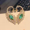 Orecchini pendenti in argento 925 Est Piuma di pavone Zircone verde intarsiato Punto di cristallo traslucido Smeraldo Orecchino versatile retrò