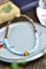 Bracelets de charme Qi Nan Agarwood 0.7 Bracelet assorti: vieille cire perle de style ancien bleu ciel motif de mer pierre gemme lumière nuages blancs propres