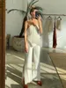 Pantalones de dos piezas para mujer Clacive Sexy Halter Sin espalda Tank Top Set Mujer 2 Bodycon Beige Plisado Mujer Elegante Flaco Hendidura Trajes de pantalón