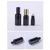 JIE MEI Pack 5ML 10ML 15ML 20ML 30ML 50ML 100ML Black Glass Roller Ball Tube Wholesale Empty Cosmetic Perfume Roll On Bottle