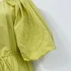 Australian designer dress with organic cotton embroidery, round neck, short sleeved lantern sleeves, waist tied, yellow vintage dress