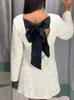 Brillant paillettes dos évider Bowknot Mini robe femmes à manches longues mince robes courtes femme vacances soirée fête Looks 240106