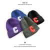 Sombrero de invierno Moda Letra C Logo Moda Calle Jersey Cúpula con puños Sombrero de lana tejido