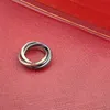 Karte plus Drei-Ring-Ring dreifarbiger Ring Modetrend Edelstahl-Titan-Stahlring