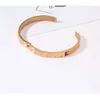 Nuovo braccialetto rigido di lusso con doppio scatto Bracciale moda coppia uomo donna Bracciale classico braccialetti di design in acciaio inossidabile gioielli 164 528