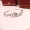 Ny kreativ full diamant personlig populär kvinnlig europeisk och amerikansk stil leopard armband fashionabla små smycken